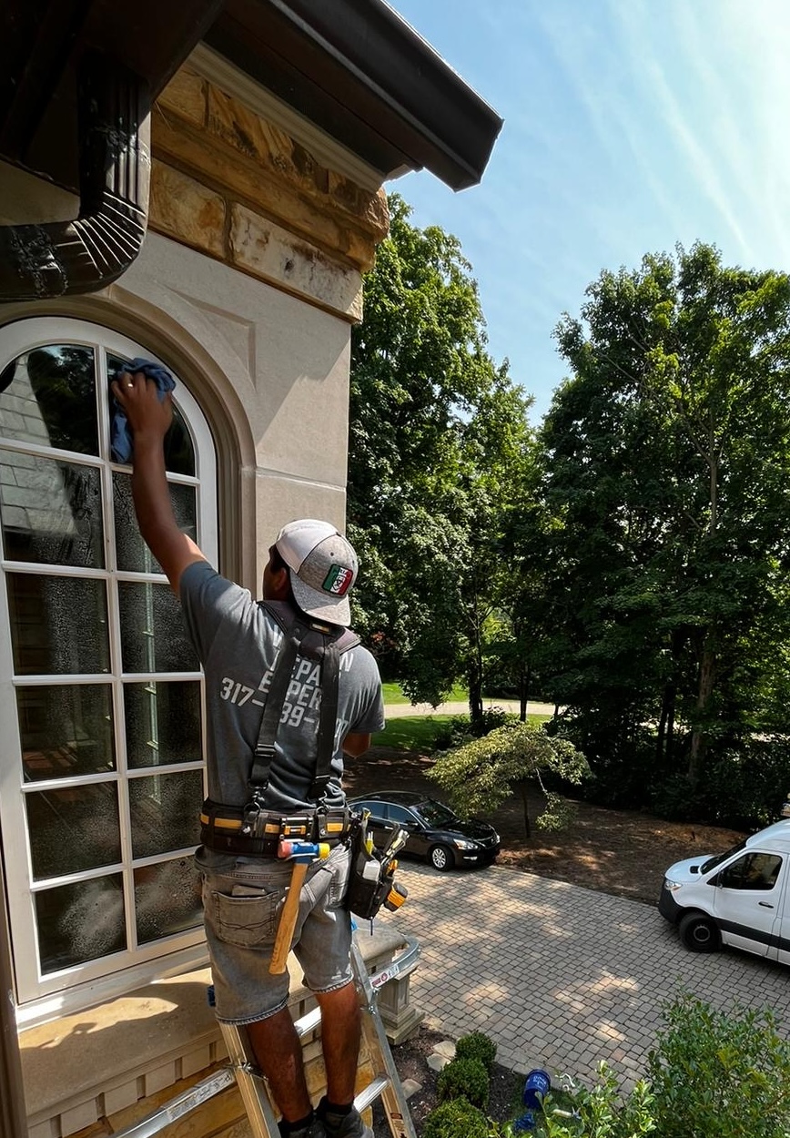 window repair on ladder